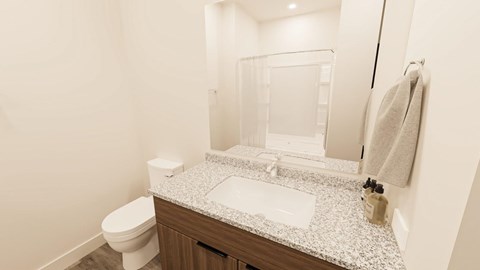 A white toilet sits next to a sink in a bathroom.