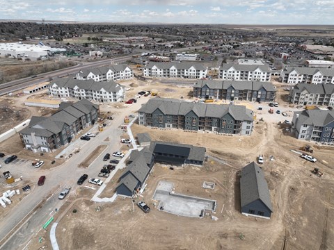 an aerial view of a housing development in a city