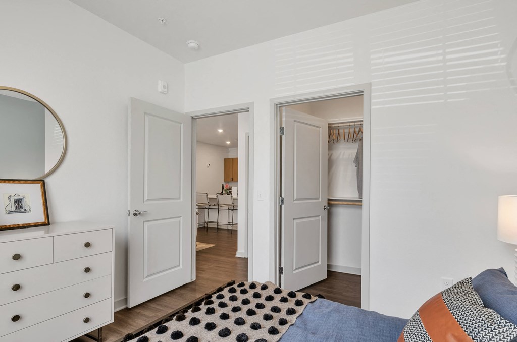 a bedroom with a bed and a mirror at Apex, Colorado Springs, 80923