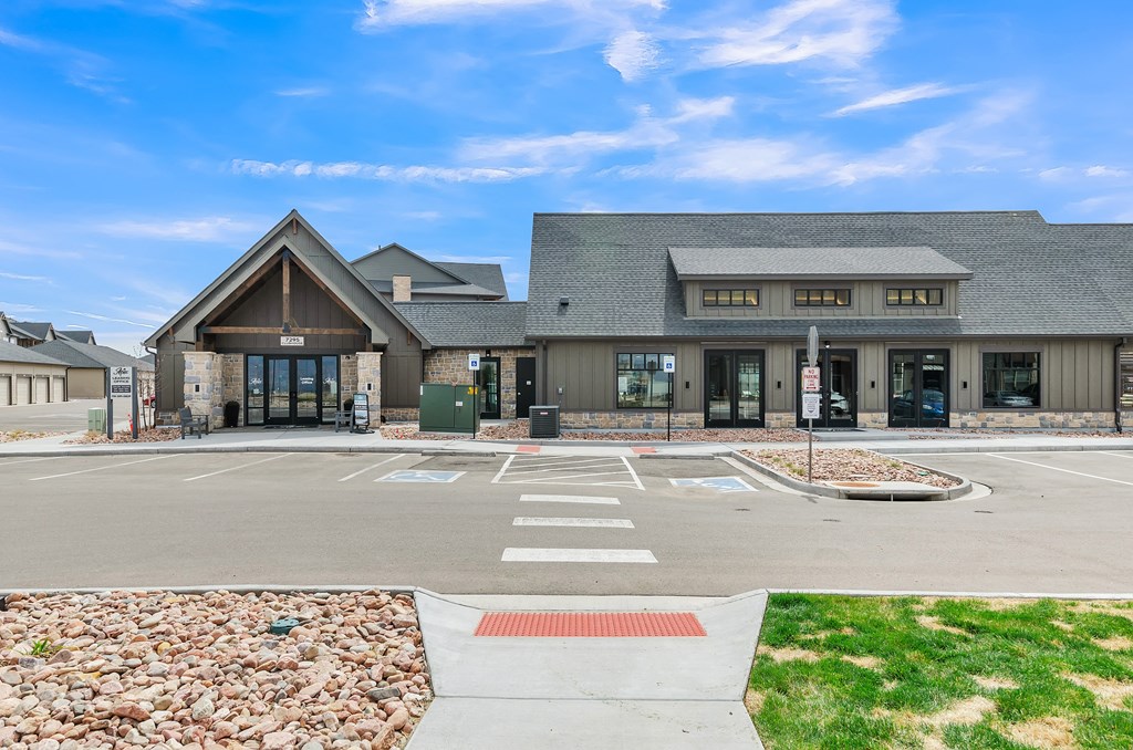 a picture of the front of the building with a blue sky in the background at Apex, Colorado Springs, Colorado