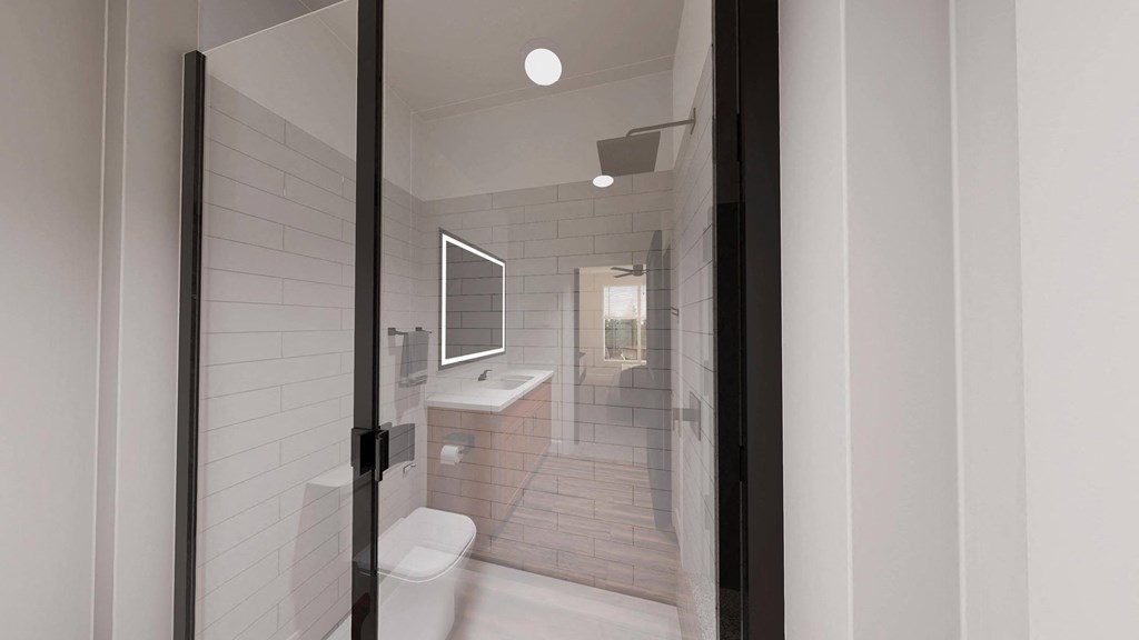 a white bathroom with a toilet and a sink