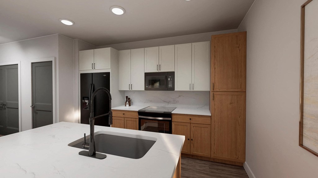 a kitchen with a white counter top and a sink