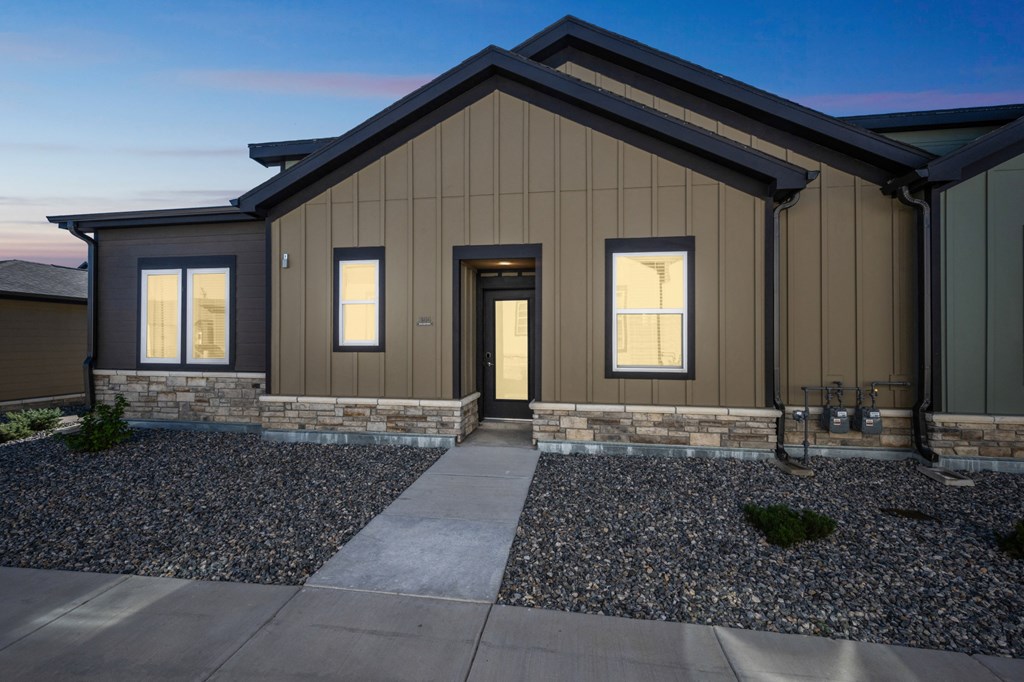 Building with a sidewalk in front of it at Citadel at Castle Pines, Colorado