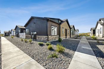 Houses with a sidewalk at Citadel at Castle Pines, Castle Pines, Colorado