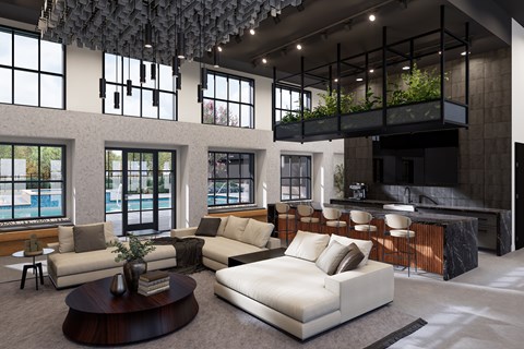 A modern living room with a large white sofa and a coffee table.