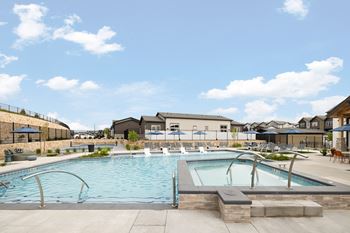 the swimming pool at the estates at spring valley apartments