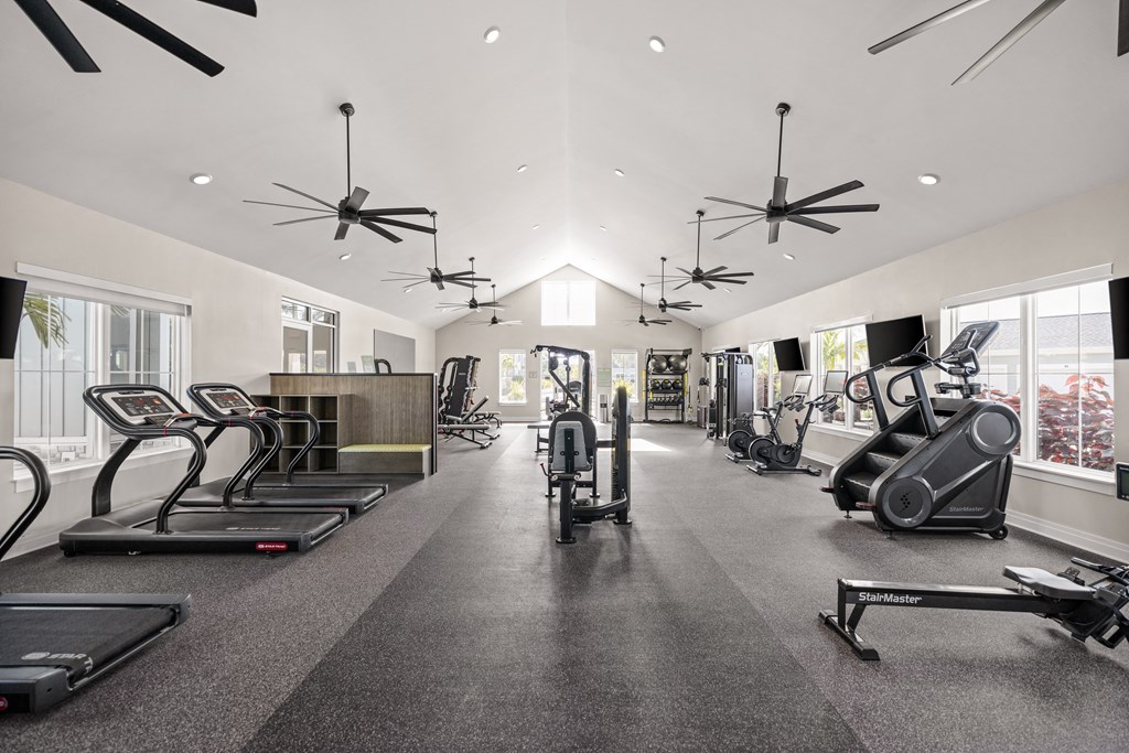 the gym with treadmills and other exercise equipment at Palm Grove in Ellenton, FL 34222