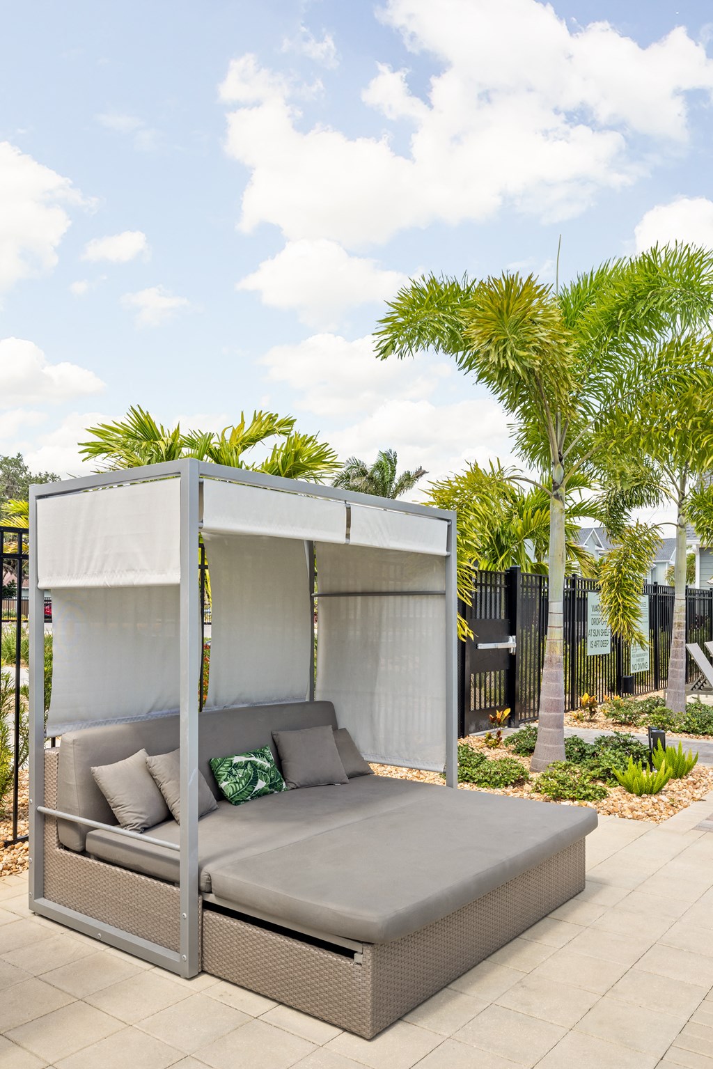 a patio with a couch and a canopy at Palm Grove in Ellenton, FL 34222