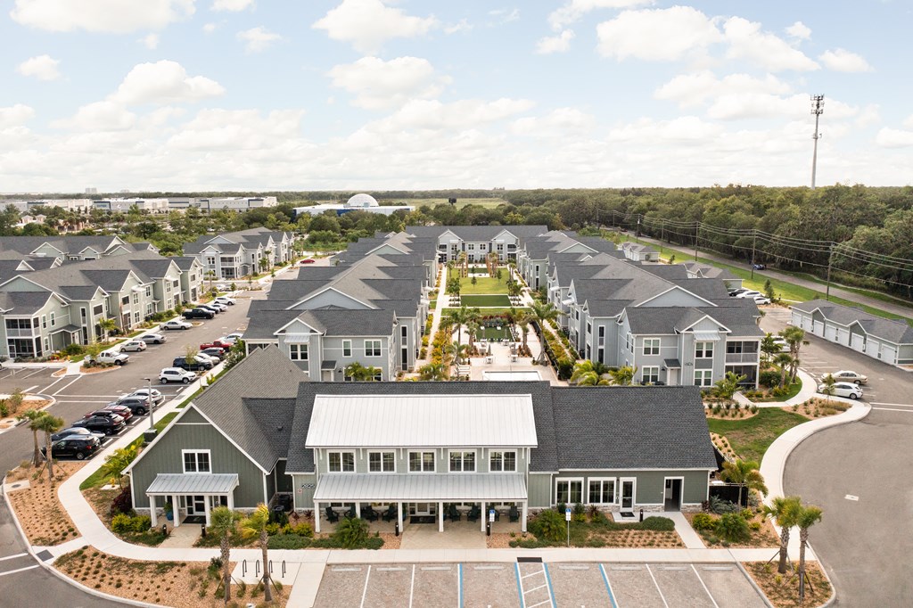 an aerial view of a large group of houses in a parking lot at Palm Grove in Ellenton, FL 34222