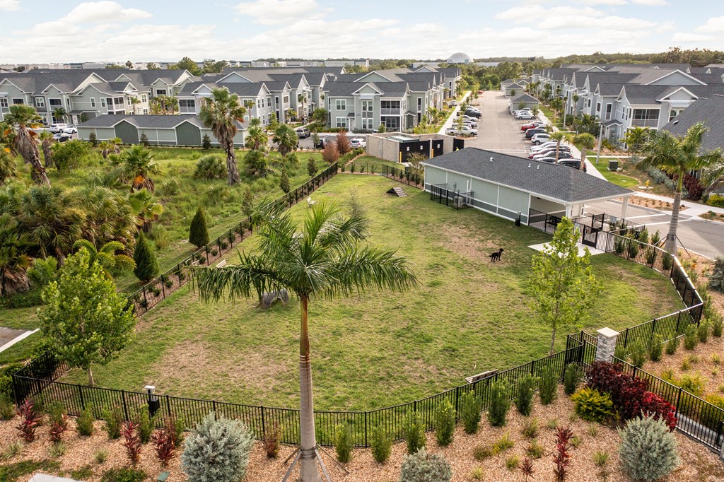 a park in the middle of a row of houses at Palm Grove in Ellenton, FL 34222