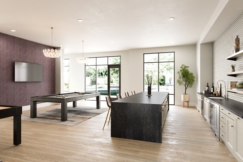 an open concept kitchen and dining area with a pool table and ping pong table at The Quarry, Fort Collins Colorado