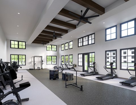 A spacious gym with a variety of equipment at Terrassa Luxury Apartments, Florida