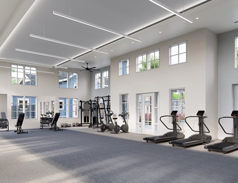 A spacious gym with treadmills, elliptical machines, and a fan. at Velara Luxury Apartments, Ponte Vedra Beach, 32081