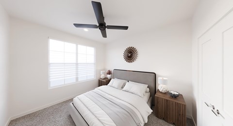 Bright bedroom with modern ceiling fan at Wrenley Luxury Homes Apartments, Georgia