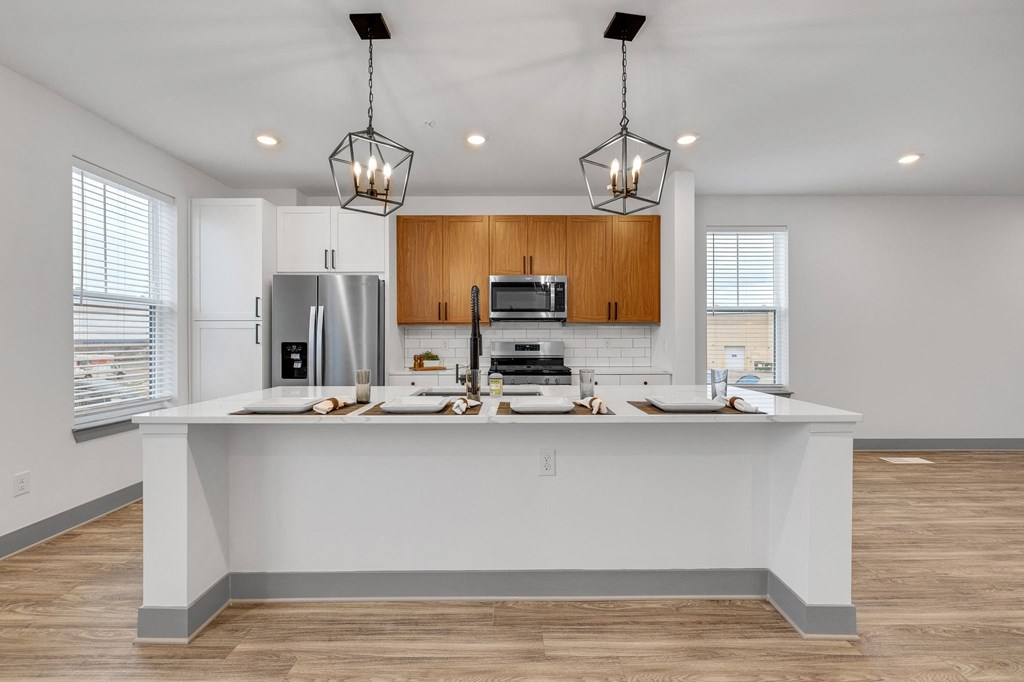 a kitchen with a large counter top and a sink at Meridian at CityPlace, Minnesota, 55125