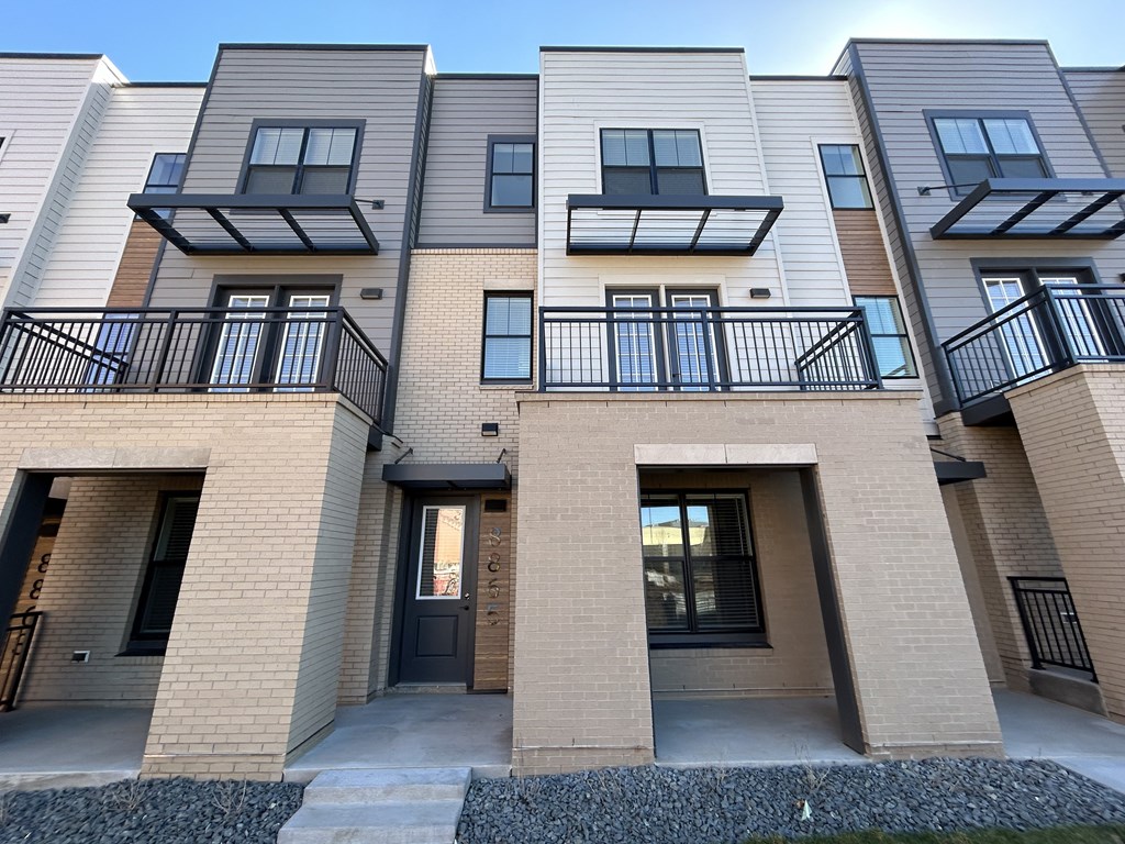 a view of the exterior of an apartment building at Meridian at CityPlace, Woodbury Minnesota