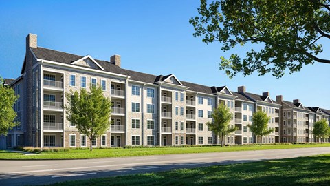 A large apartment complex with multiple buildings and balconies.