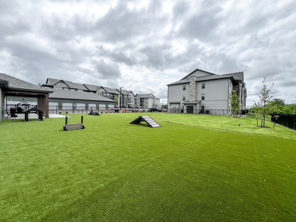 a large lawn with a ramp in the middle of it at The Depot, Raymore, Missouri