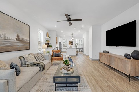 a living room with a couch and a tv