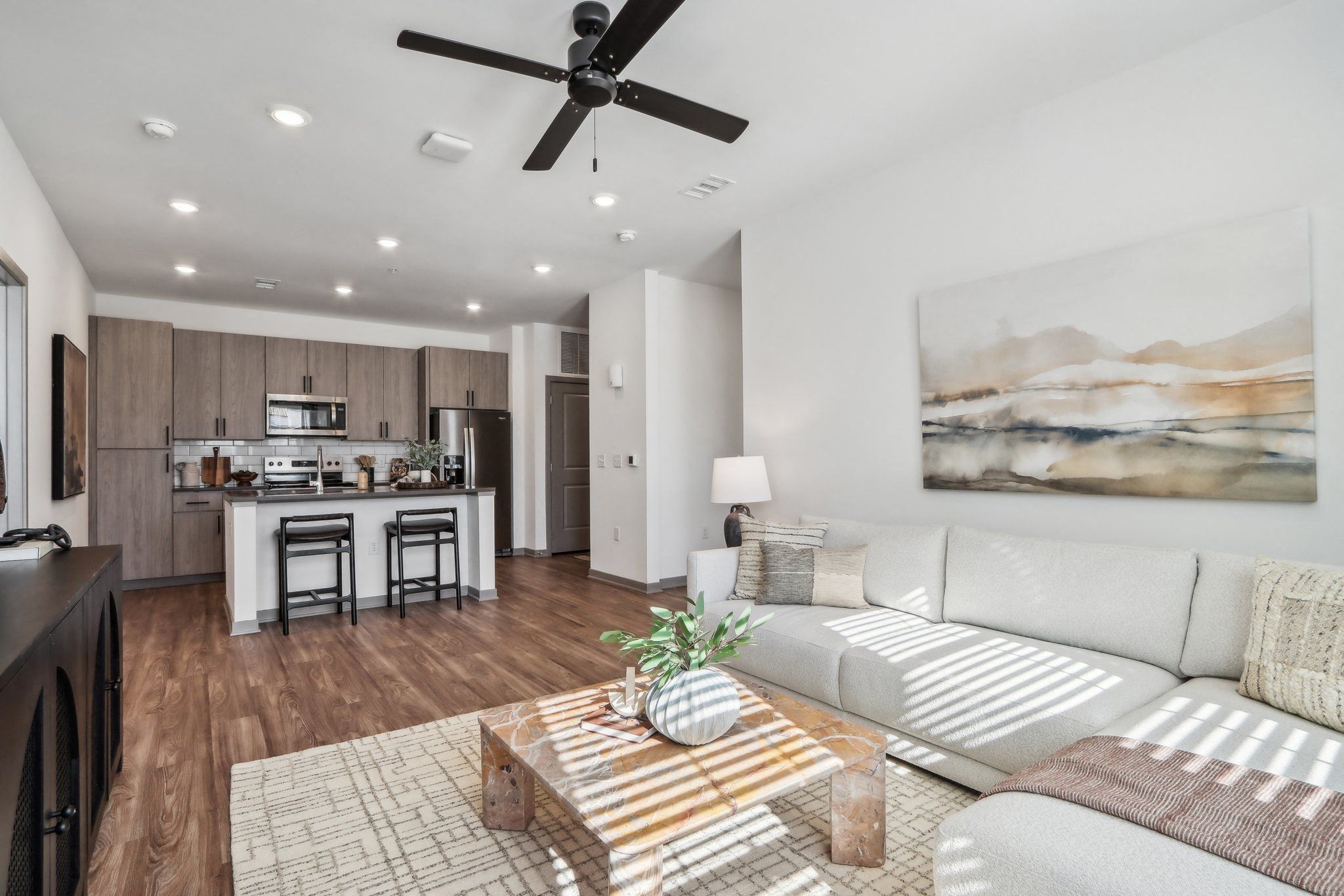 a living room with a couch and a table