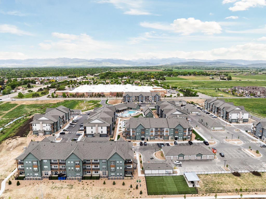 an aerial view of a group of houses in a suburb