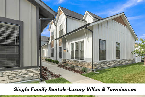 a single family rentals luxury villas and townhomes on a street with grass at Slate at Fishers District, Indiana, 46037