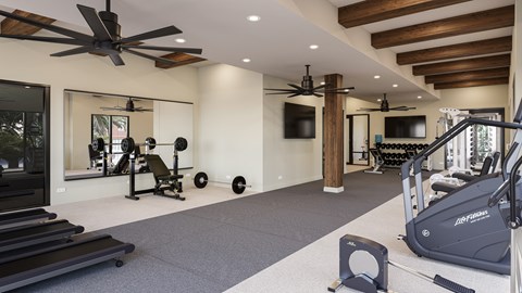 A spacious home gym with a variety of exercise equipment.