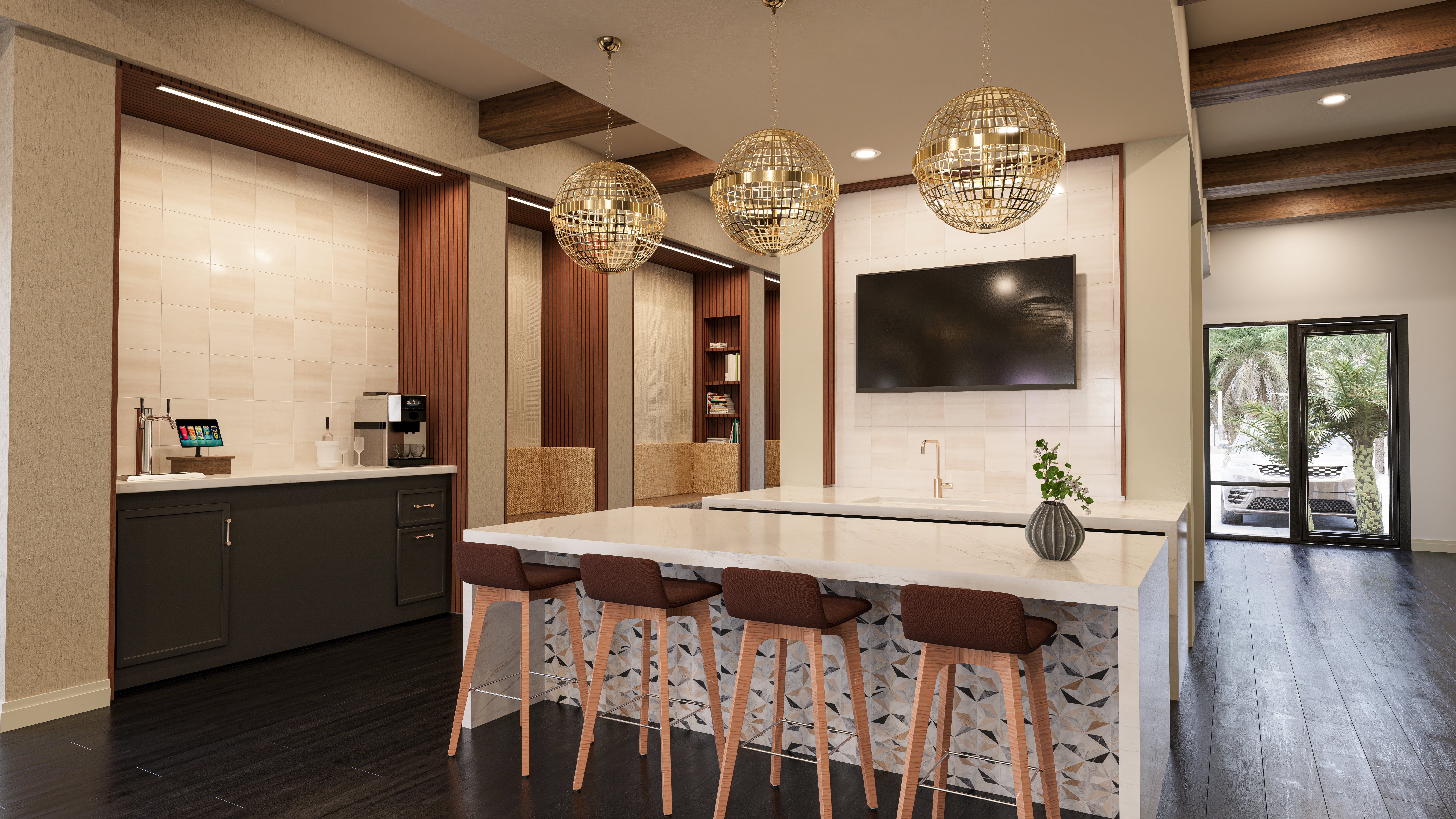 A modern kitchen with a bar area and a television mounted on the wall.