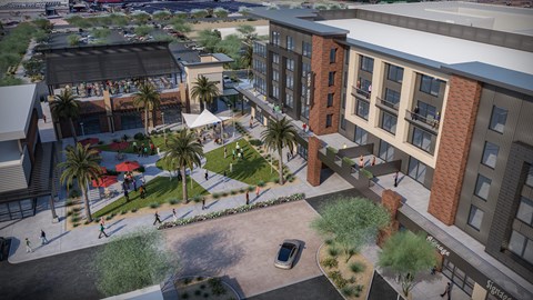 A rendering of a courtyard surrounded by buildings with a car parked in the foreground.at The Residences at The Gilmore in Gilbert, AZ