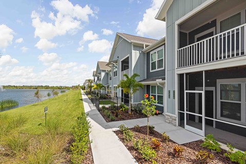 A row of houses with a walkway in between.