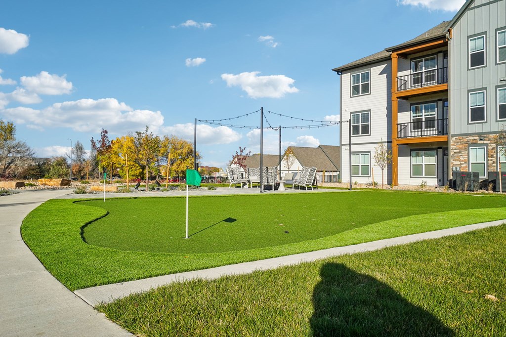 green lawn and sidewalk at Premier at West Park Luxury Apartment Homes, Greeley