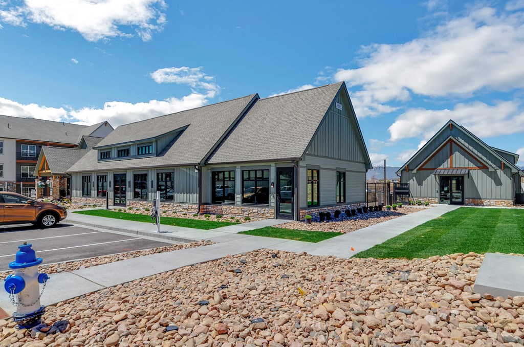 a house with a blue fire hydrant in front of it  at Upland Flats, Colorado Springs