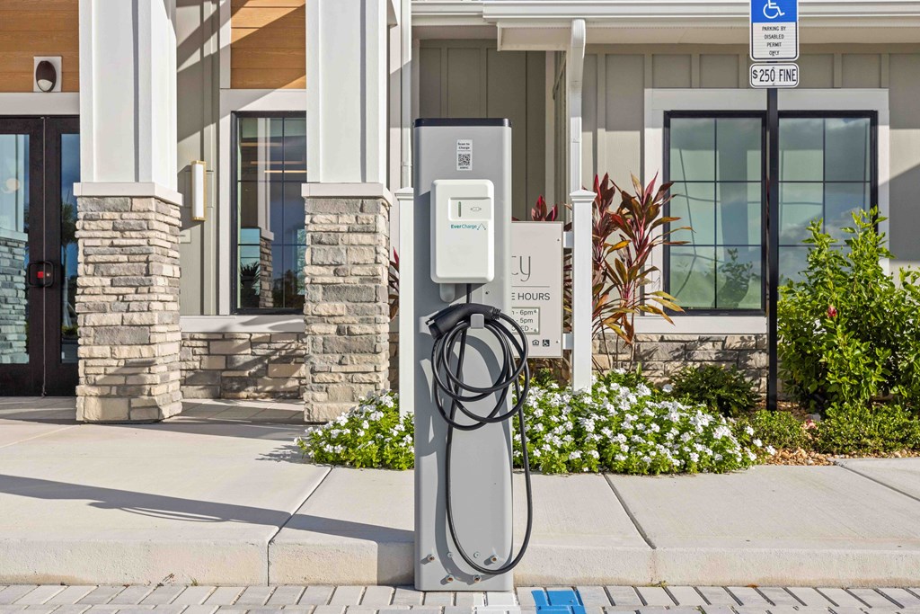 A charging station for electric vehicles is located outside a building.