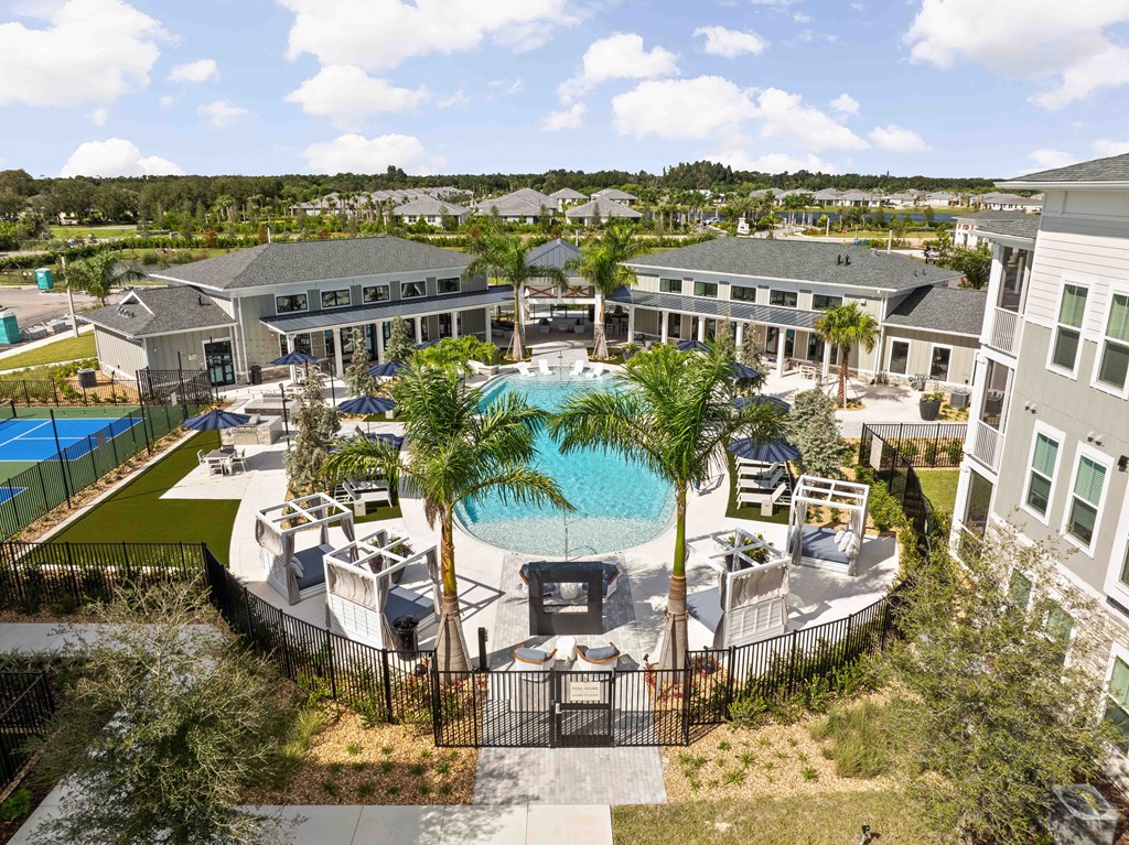 A large building with a pool in the middle of it.