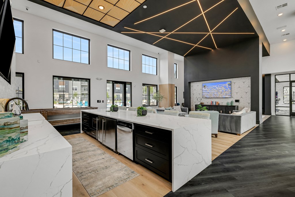 a kitchen with an island and a living room in the background  at Prism at Diamond Ridge, Pennsylvania, 15108