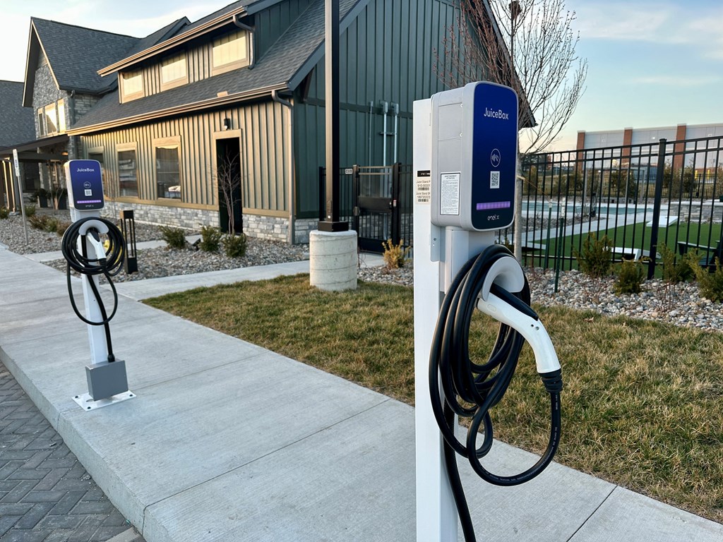 a charging station for electric vehicles outside of a house at The Depot, Raymore, Missouri