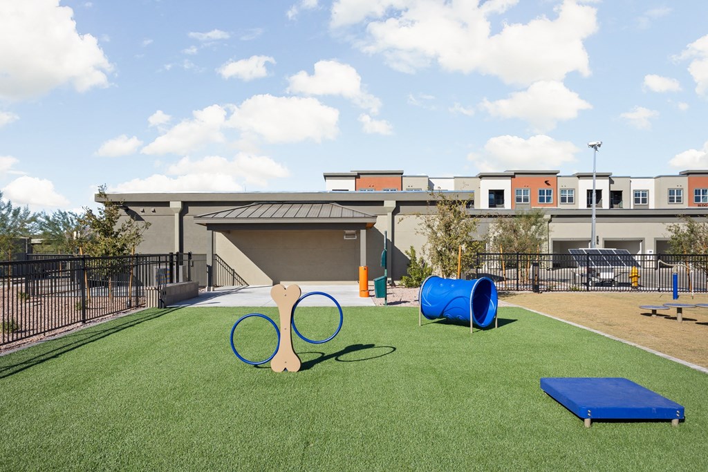 our apartments have a playground with a tennis racket and cones at The Maddox Luxury Apartment Homes, Buckeye