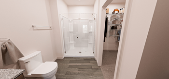 A white toilet in a bathroom with a walk in shower at Verity Luxury Apartment Homes Apartments, Vero Beach