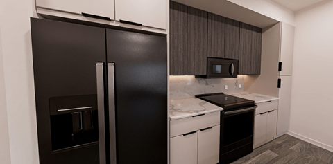 A black refrigerator is in a kitchen with white countertops at Verity Luxury Apartment Homes Apartments, Vero Beach, FL 32960