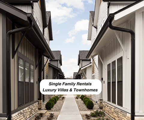 a row of single family homes with a path between them and a logo for single