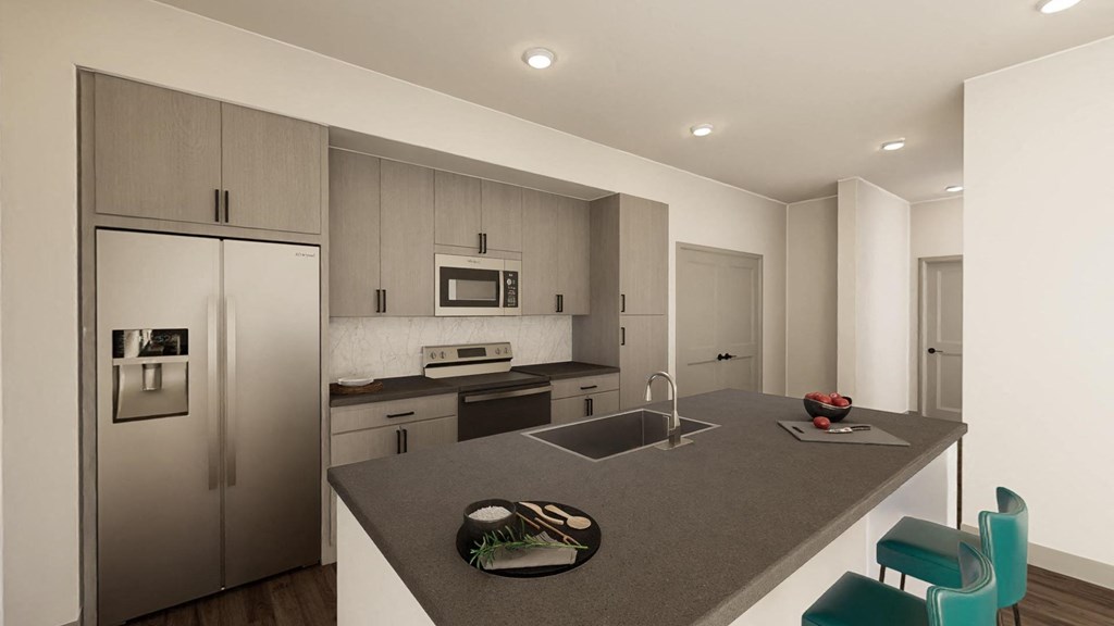 a kitchen with a large island and stainless steel appliances at Stella, San Tan Valley, AZ