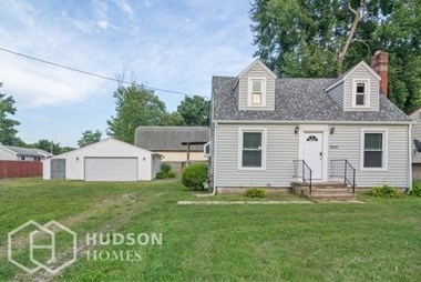 Hudson Homes Management Single Family Home For Rent Pet Friendly 10115 Bryant Dr Columbia Station 44028 3 bedrooms dishwasher microwave hardwood floor carpet back porch two story fireplace detached garage