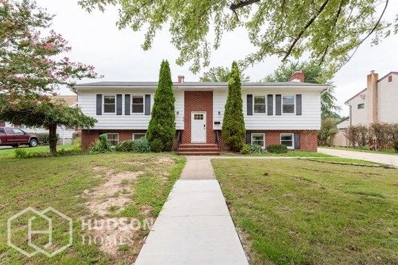 Hudson Homes Management Single Family Home For Rent Pet Friendly 108 Shell Cove Ct Joppa MD 21085 4 bedrooms 3 bathrooms microwave refrigerator dishwasher hardwood carpet family room river front Gunpowder River fireplace natural light private pool - Photo Gallery 1