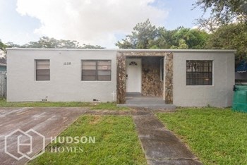 Hudson Homes Management Hudson Homes Management Single Family Home For Rent Pet Friendly 1228 NW 43rd St Miami FL 33142 ceiling fan private driveway back yard - Photo Gallery 2