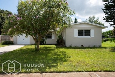 Hudson Homes Management Single Family Home For Rent Pet Friendly 4850 Worth Ave Titusville Florida 32780 Attached Garage screened in patio dishwasher microwave