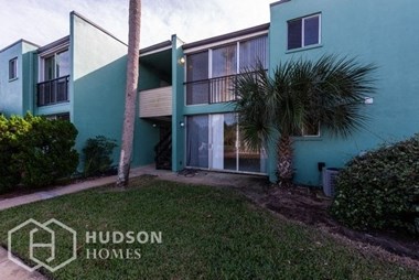 Hudson Homes Management Single Family Home For Rent Pet Friendly 5500 Ocean Shore Blv Unit 75 Ormond Beach FL 32176 2 bedrooms 2 bathrooms stainless steel appliances sliding glass doors patio washer dryer