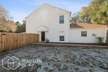 Hudson Homes Management Single Family Home For Rent Pet Friendly 6115 Oak Cluster Circle Tampa FL 33634 2 bedrooms 2.5 bathrooms ceiling fans refrigerator laundry room attached garage screened porch fenced yard