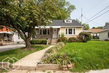 Hudson Homes Management Hudson Homes Management Single Family Home For Rent Pet Friendly 6402 Lehnert St Gwynn Oak MD 21207 4 bedrooms carpet back yard courtyard black appliances fireplace hardwood - Photo Gallery 2