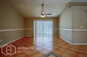 Hudson Homes Management Single Family Home For Rent Pet Friendly 11224 Bramblebrush St Tampa FL 33624 3 bedrooms 2 bathrooms carpet high ceilings stainless steel appliances ceiling fans dishwasher refrigerator microwave granite countertops attached garage - Photo Gallery 3