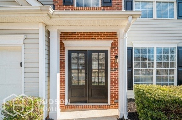 a front door of a house with a porch